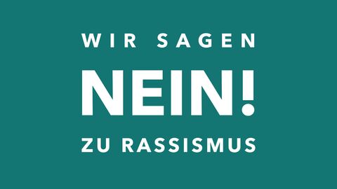 Nein zum Rassismus Bild mit dem Text "Wir sagen Nein zum Rassismus"